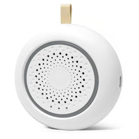 Baby sound machine placed near a crib