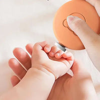 Close-up of the grinding head on the baby nail trimmer