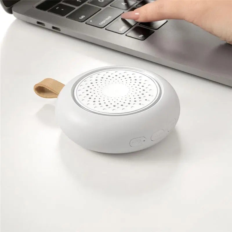 Baby sound machine displaying its night light feature