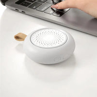 Baby sound machine displaying its night light feature