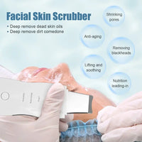 Vibrating facial cleansing spatula with charging cable and packaging